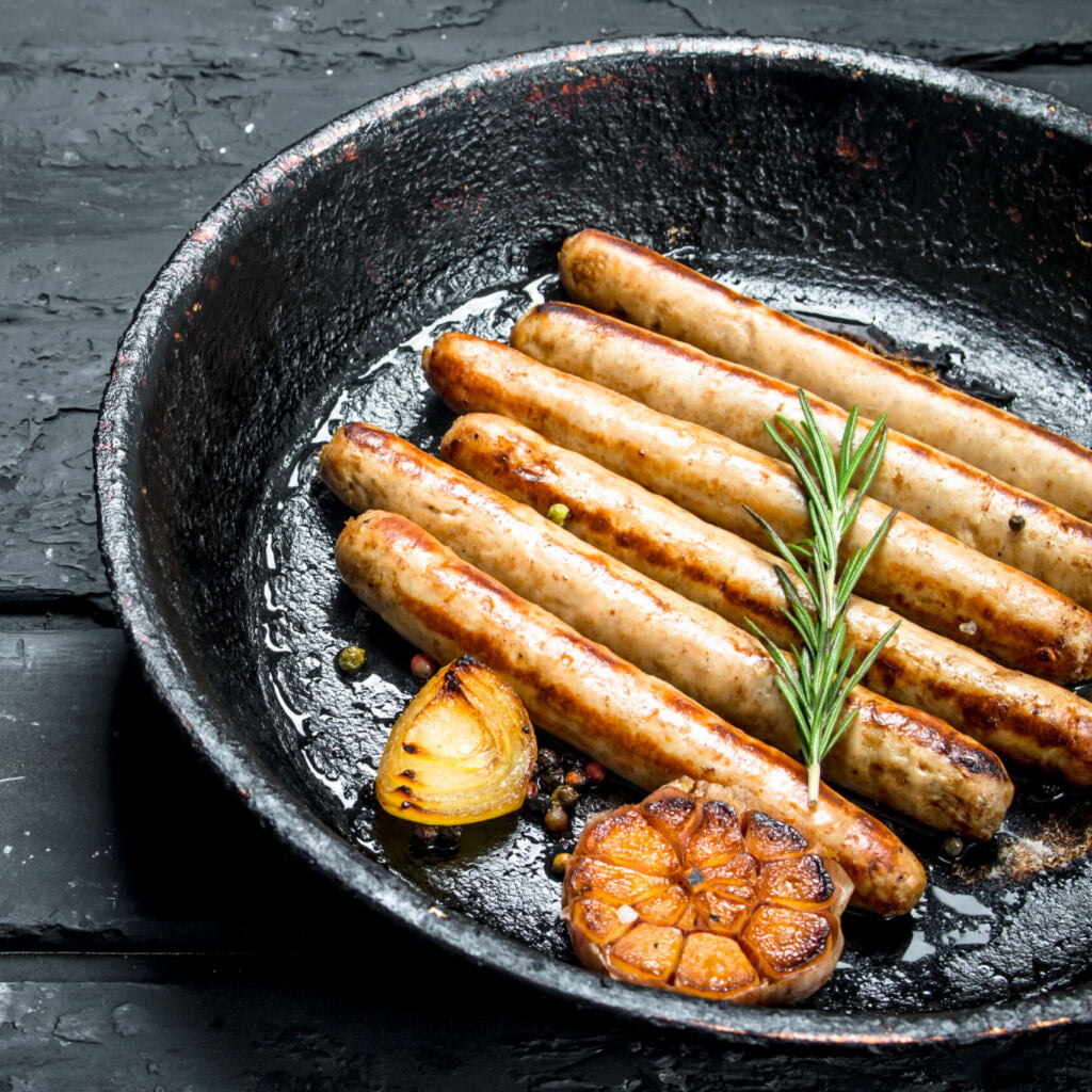 frying Traditional Pork sausages